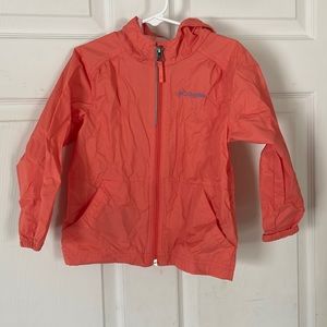Girls coral colored windbreaker. Excellent condition.